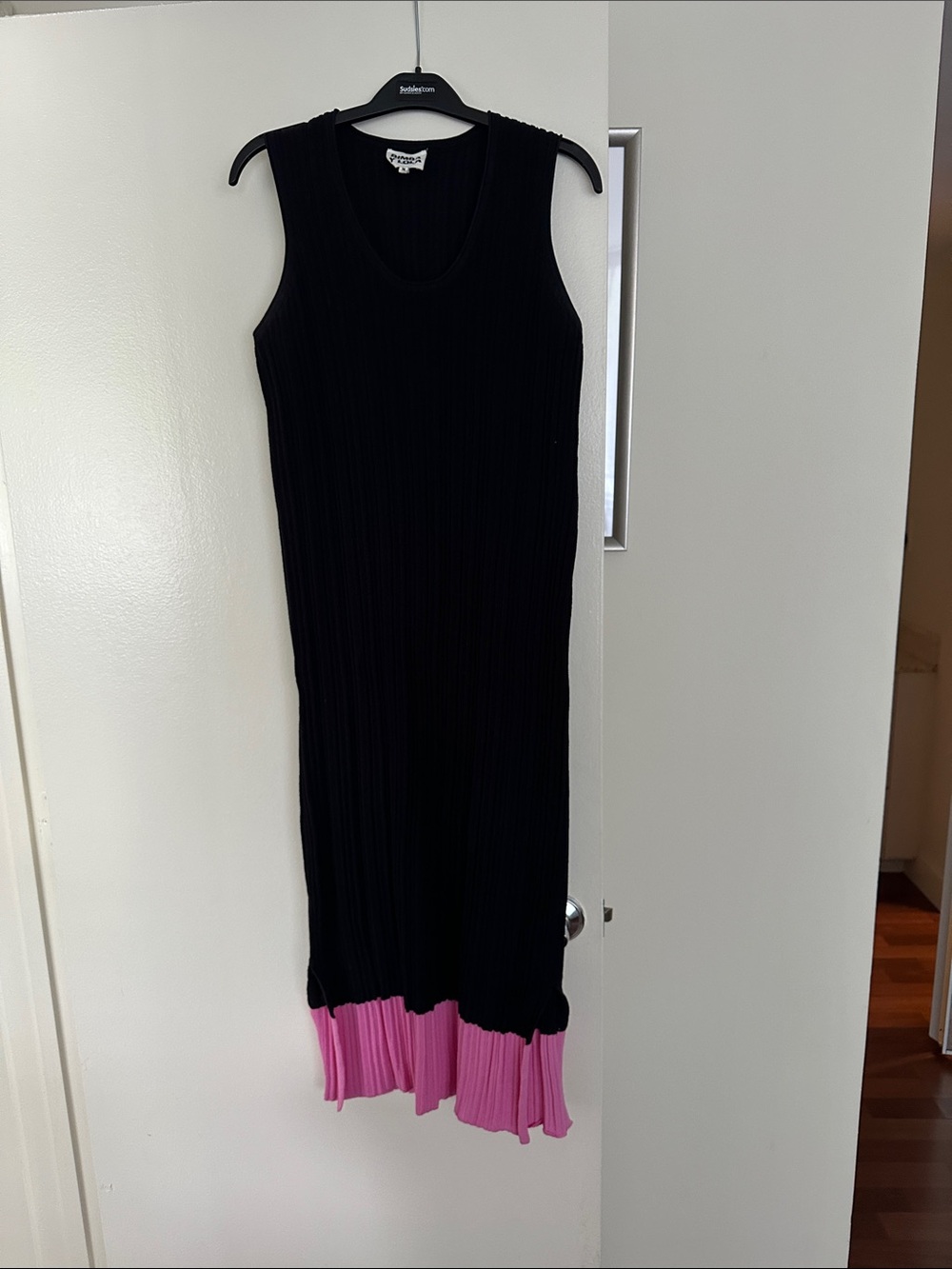 Girls' Sleeveless Black Dress with Pink Ruffle Hem